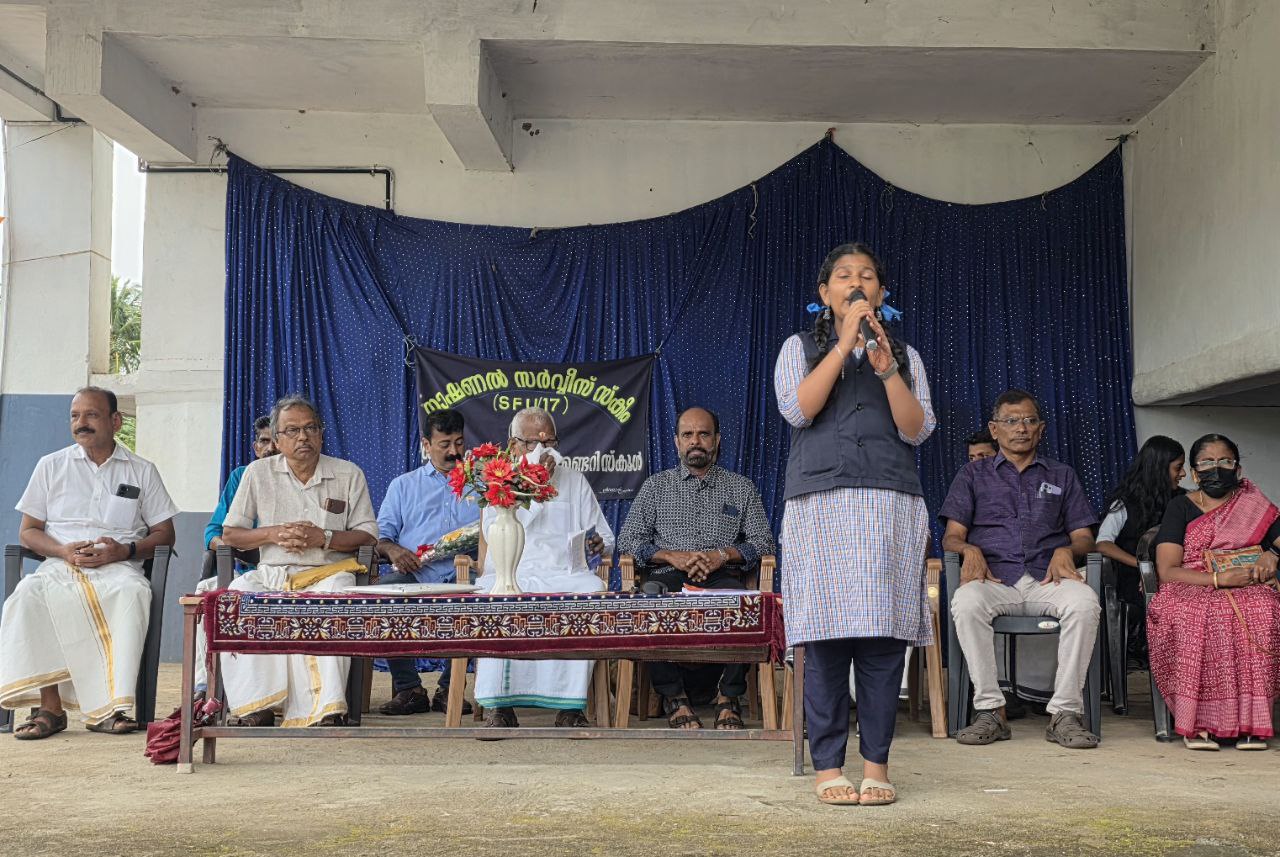 Audience applauding students