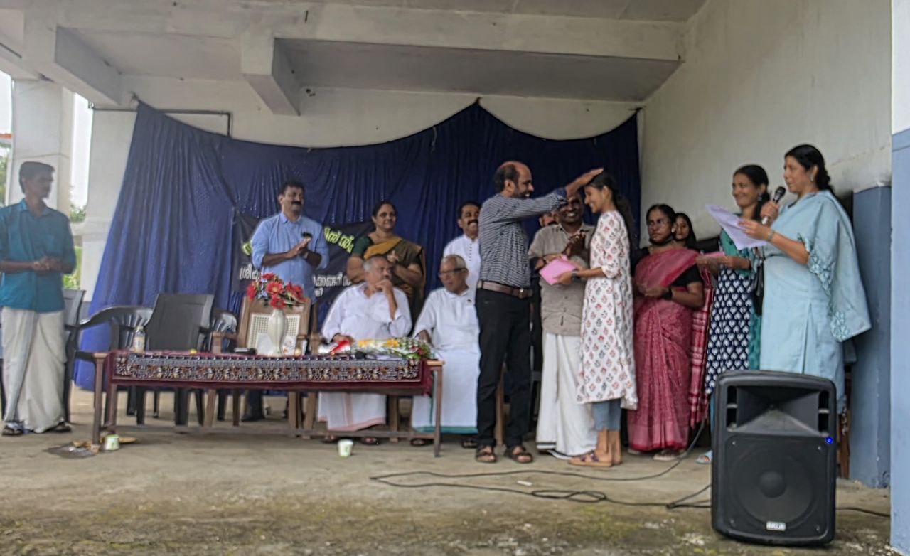 Class toppers group photo with trophies